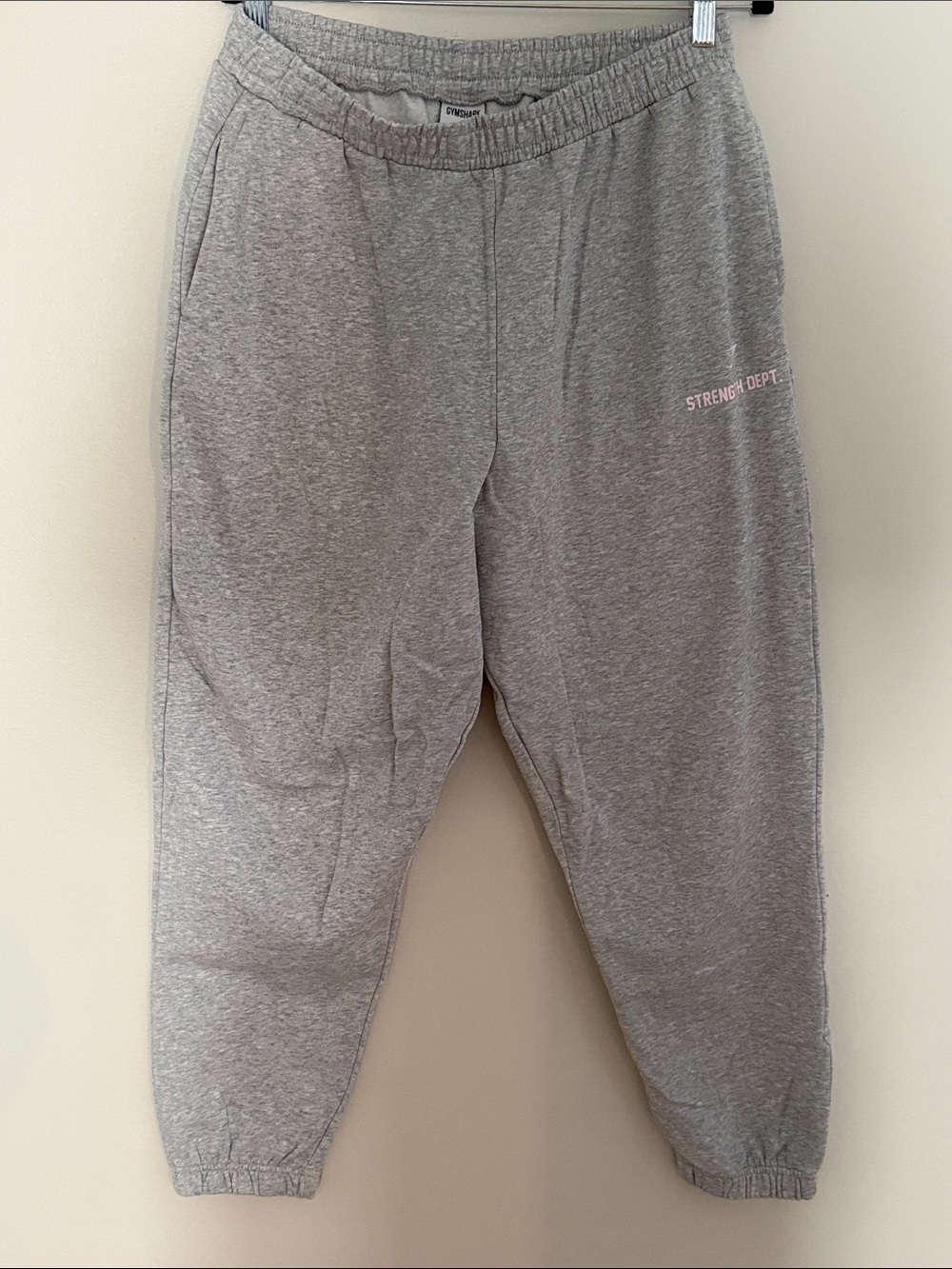 Gymshark Women's Gray Sweatpants with Pink 'Strength Dept.' Accent